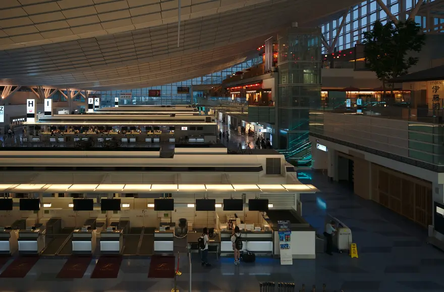 Check-in counters inside Haneda Airport’s international departure hall