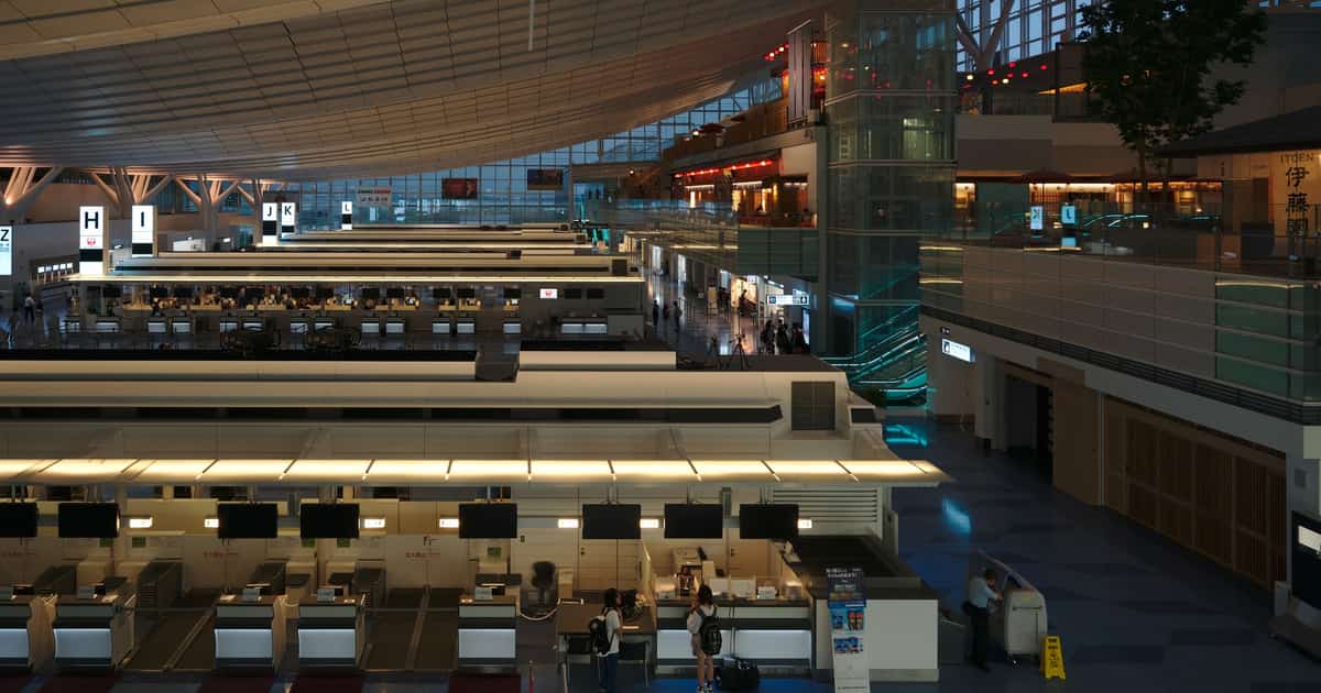 Check-in counters inside Haneda Airport’s international departure hall